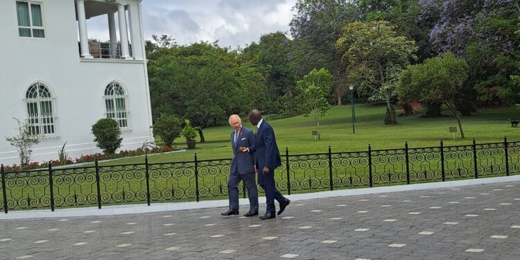 President William Ruto (left) and King Charles walk at State House on October 31, 2023.