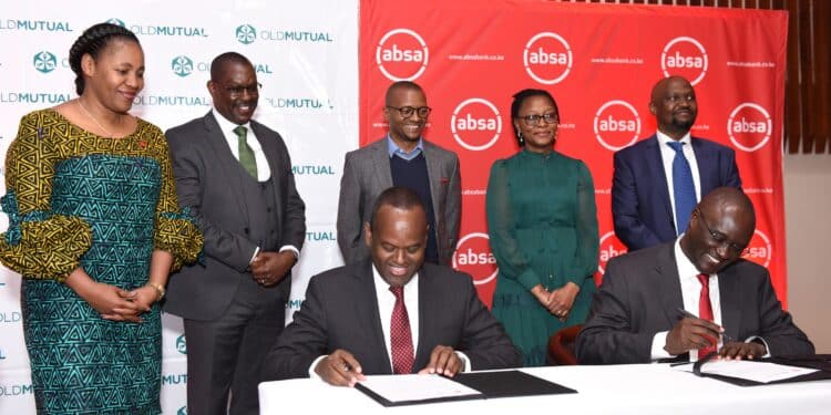 Absa Bank Kenya MD & CEO Abdi Mohamed and Old Mutual East Africa Group CEO Arthur Oginga sign an MoU signifying the launch of the Linda Biz SME bundled insurance solution. Photo/ Absa