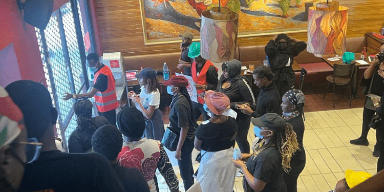  Vincent Chepkwony seen allowing protesters inside Java House Kimathi Street on June 18, 2024, and Hatari Security. Photo/Courtesy
