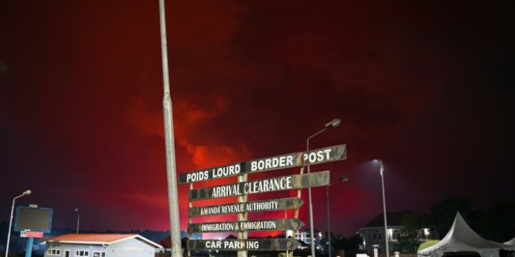 The red sky from the Nyiragongo volcano in DR Congo seen from the border at Gisenyi, Rwanda | AFP