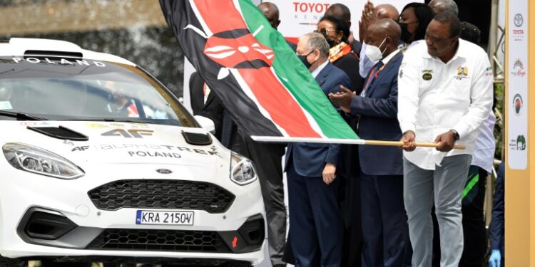 Kenyan President Uhuru Kenyatta (R) started the rally | AFP