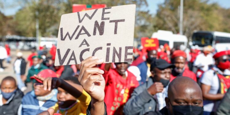 South Africa is seeing a surge in Delta variant Covid infections against the backdrop of a faltering vaccine rollout | AFP