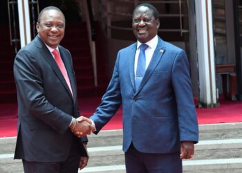 Kenya's President Uhuru Kenyatta (left) and onetime foe Raila Odinga declared a truce with a headline-grabbing handshake in 2018 | AFP