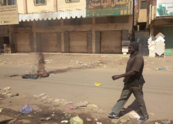 Shops are seen closed in Khartoum's Sajane Market on January 18, 2022, as part of a civil disobedience campaign following the killing of seven anti-coup demonstrators, including a merchant from the market | AFP