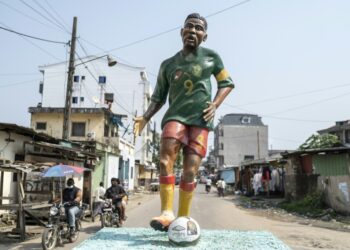 A statue of Samuel Eto'o in the green, yellow and red of Cameroon stands in the New Bell neighborhood of Douala where he grew up | AFP