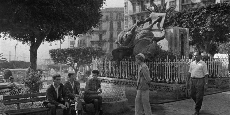 Picture taken on August 4, 1962 of the unbolting of the equestrian statue of Joan of Arc, which was on Square Laferrière in Algiers, brought down from its pedestal by Algerian demonstrators | AFP