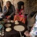 A member of a women's rights group meets with women in a remote village in Morocco, where a legal loophole has resulted in thousands of child marriages annually | AFP