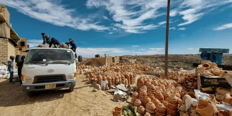 Ceramic pots are loaded onto a truck in front of a workshop in the Libyan town of Gharyan, 100 km (60 miles) southwest of the capital Tripoli | AFP