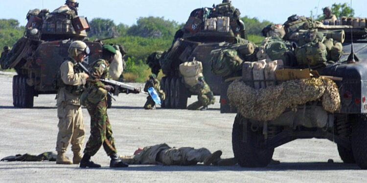 Kenyan military troops and US marines carry out a joint military exercise in Manda bay near the coastal town of Lamu 15 January 2004 AFP PHOTO/SIMON MAINAKenyan military troops and US marines carry out a joint military exercise in Manda bay near the coastal town of Lamu 15 January 2004. AFP PHOTO/SIMON MAINA | AFP