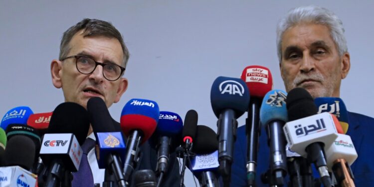 (L to R) Volker Peretz, special representative of the United Nations to Sudan, and Mohamed Lebatt, special envoy of the African Union, address a news conference in Khartoum | AFP
