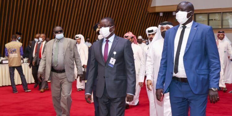 Chad's Prime Minister Albert Pahimi Padacke arrives at the start of peace talks in Doha on Sunday | AFP