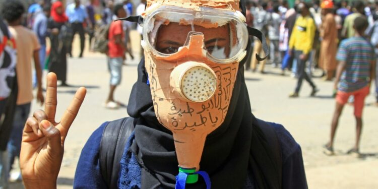 A Sudanese anti-coup protester during a February 28, 2022 demonstration in the capital Khartoum | AFP
