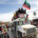 A parade to commemorate the 2011 uprising that toppled Libyan strongman Moamer Kadhafi, in the coastal city of Tajura, east of the capital Tripoli, on February 25, 2022 | AFP