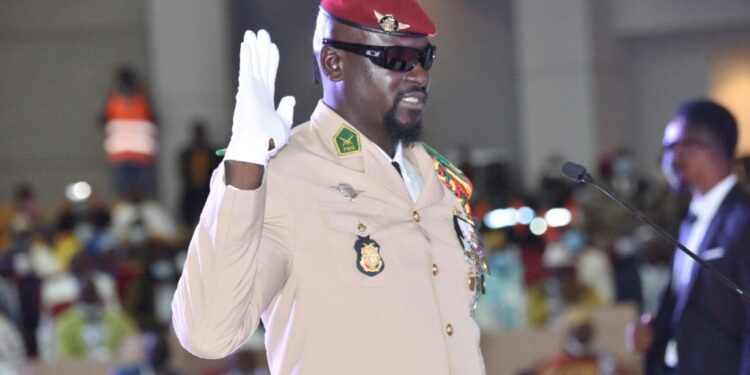 Guinea junta leader Colonel Mamady Doumbouya is pictured at his swearing in ceremony in October 2021 in Conakry | AFP