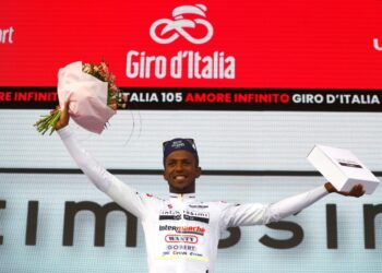 Youthful promise: Biniam Girmay celebrates after pulling on the best young rider jersey in the Giro d'Italia | AFP