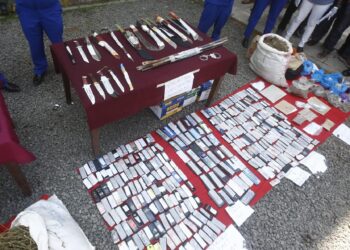 Police In Nakuru Display Items recovered during a crackdown on the confirm criminal gang