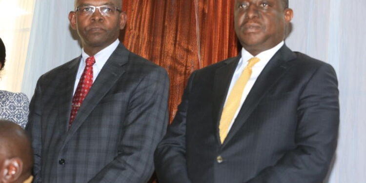 Former Treasury Cabinet Secretary Henry Rotich and Principal Secretary Kamau Thugge at Milimani Anti-corruption Court.
Photo: The Standard