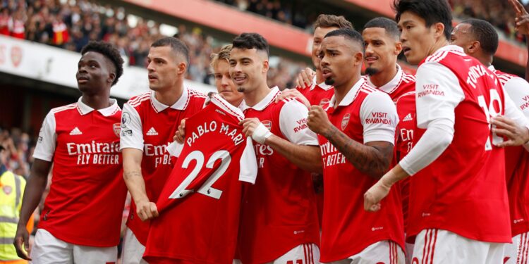 Arsenal players hold up a Pablo Mari shirt after their opening goal against Nottingham Forest: IMAGE/Arsenal