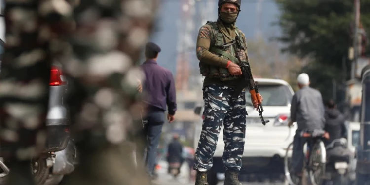 Indian security officer manning the street in Srinagar.
Photo: Courtesy