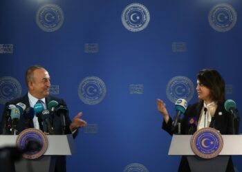 Libyan Foreign Minister Najla al-Mangoush and Turkish Foreign Minister Mevlut Cavusoglu speak to reporters after s signing a maritime gas deal | AFP