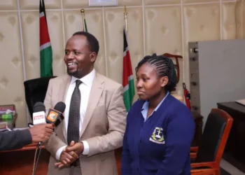 Trans Nzoia governor George Natembeya with Elizabeth Robai - the dancing pediatric nurse captured in a viral video. PHOTO/Facebook