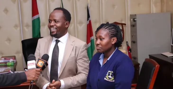 Trans Nzoia governor George Natembeya with Elizabeth Robai - the dancing pediatric nurse captured in a viral video. PHOTO/Facebook