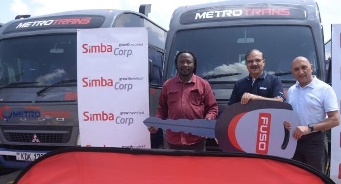 MetroTrans CEO Oscar Rosanna, Simba Corp Motors MD Naresh Leekha and Mehul Sachdev, Product Manager, Pick Ups and Buses, during the handover of the fleet of 20 new Fuso buses to Metro Trans Ltd. [ PHOTO / Courtesy ]