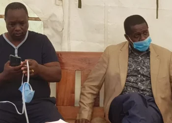 Former IEBC CEO James Oswago (left) and his co-accused Wilson Kiprotich at the Anti-Corruption Court on Wednesday, May 27, 2020. Photo/Courtesy