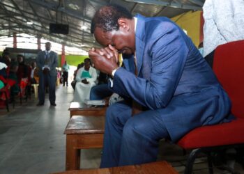 Wiper leader Kalonzo Musyoka praying during a past church service.