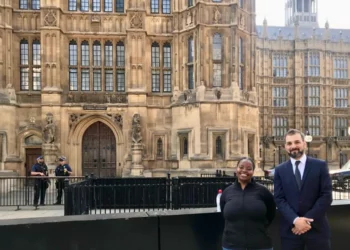 TBIJ reporter Emiliano Mellino and Sybil Msezane outside the House of Lords | TBIJ