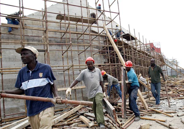 Isaac Okoth working at a construction site as casual laborer earns KSh.500