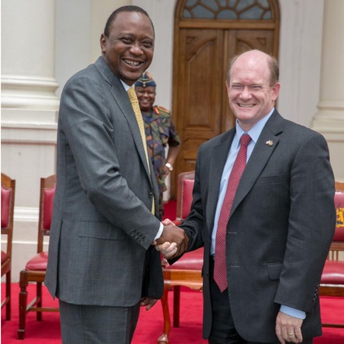 Former President Uhuru Kenyatta and US Senator Coons during the 2018 handshake