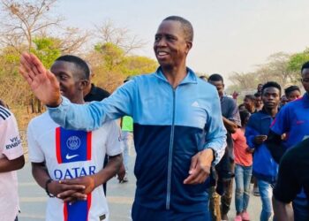 EX Zambian president greeting citizens during his jogging sessions.