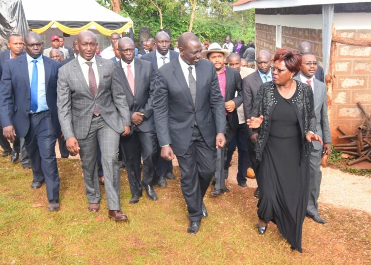 Water Cabinet Secretary Alice Wahome (right) welcomes President William Ruto in Kandara during a funeral in 2019. 