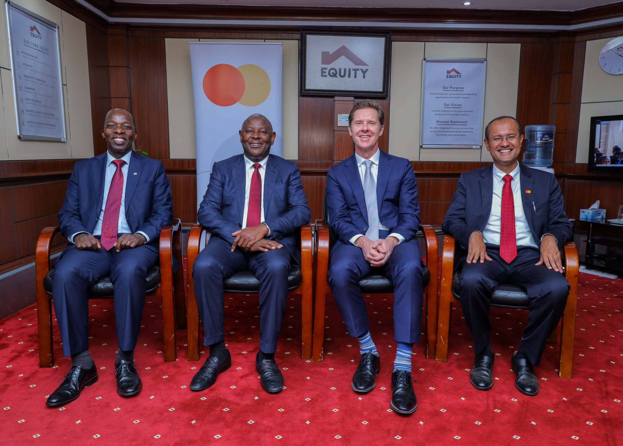 From left Samuel Makome, Equity Group Chief Commercial Officer, Dr. James Mwangi, Equity Group Managing Director and CEO, Mark Elliott, Division President for Sub Saharan Africa at Mastercard and Shehryar Ali, Senior Vice President - Country Manager for East Africa at Mastercard. PHOTO/Equity.