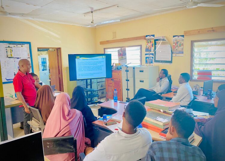 Judiciary IT staffers conduct a training session in Wajir County. 