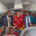 Transport CS Kipchumba Murokoen left) poses for a photo with Mang'u High School students during the nahding over of an aircraft on September 20, 2023.