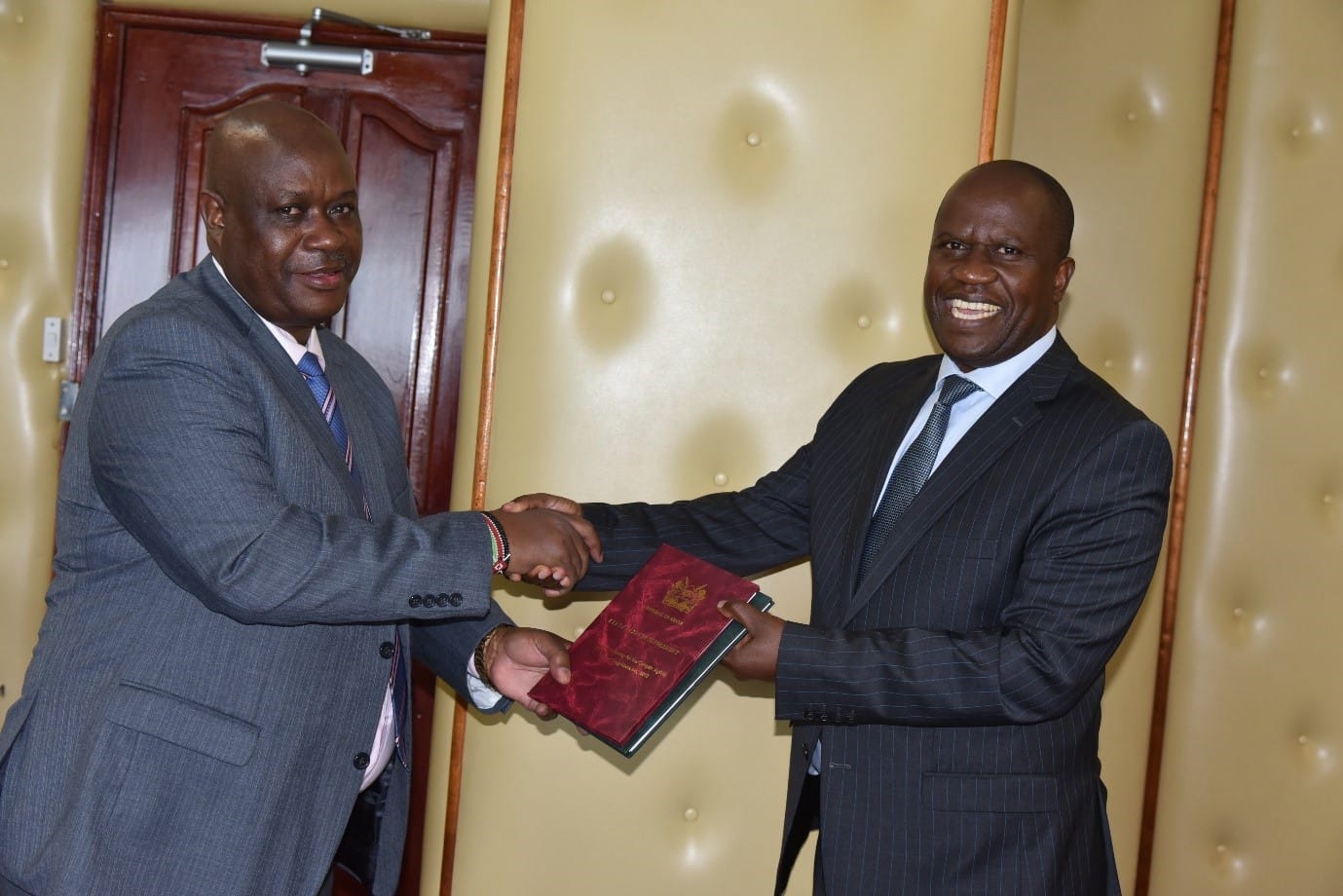 NACADA CEO Victor Okioma (left) welcomes Rev. Stephen Mairori follwoing his appointment as NACADA Board Chair on January 24, 2023. 