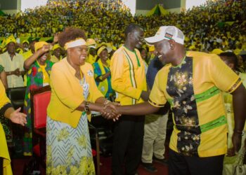 Water and Sanitation Cabinet Secretary Alice Wahome (left) shakes hands with President William Ruto during a UDA faction in 2022.