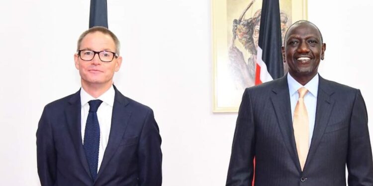 UK's High Commissioner to Kenya Neil Wigan (left) poses for a photo with President William Ruto after presenting his credentials on September 1, 2023.