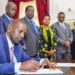 President William Ruto signs the Finance Bill 2023 into law on June 26, 2023. Looking on are Deputy President Rigathi Gachagua, Prime Cabinet Secretary Musalia Mudavadi and other leaders.