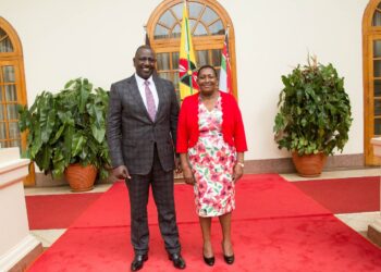 President William Ruto with Communications Authority Board Chairperson Mary Mungai.