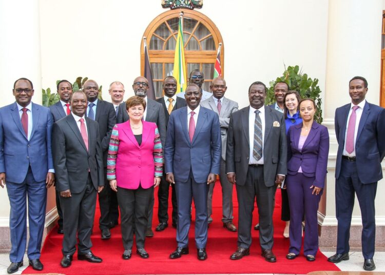 President William Ruto (third from right) and other senior government officials pose for a photo with IMF's delegation in a past meeting. 