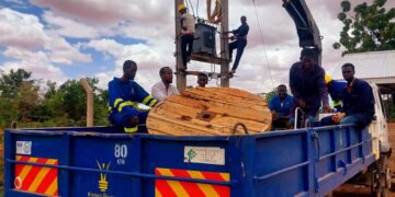 Kenya Power employees working on a transformer PHOTO/Courtesy