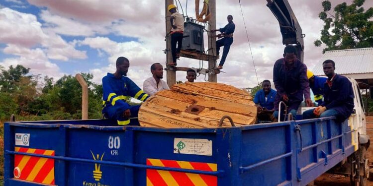 Kenya Power employees working on a transformer PHOTO/Courtesy