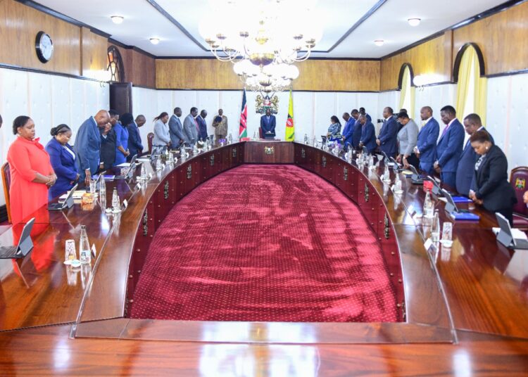 President William Ruto leads cabinet secretaries in prayer during a cabinet meeting on October 3, 2023 at State House.