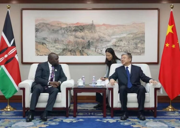 Transport CS Kipchumba Murkomen (left) holds talks with his Chinese Counterpart Li Xiaopeng during a meeting in Beijing on September 28, 2023. 