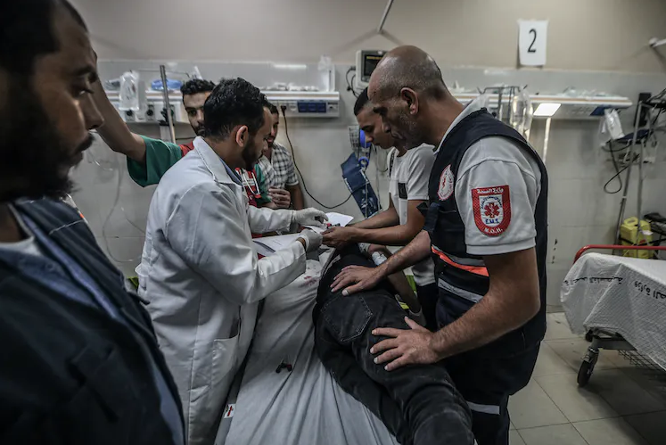 A citizen receives first aid at a hospital in Khan Yunis, Gaza, on Oct. 16, 2023. Abed Zagout