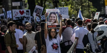Israelis whose relatives are being held hostage demonstrate on October 26, 2023 in front of the Defense Ministry building in Tel Aviv, demanding the government to bring back their loved ones.