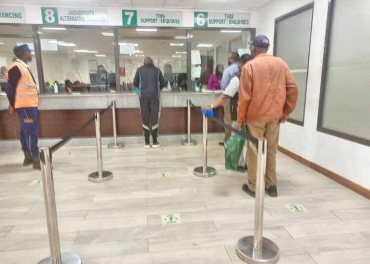 Motor vehicle owners line up to collect new generation number plates at NTSA headquarters. 